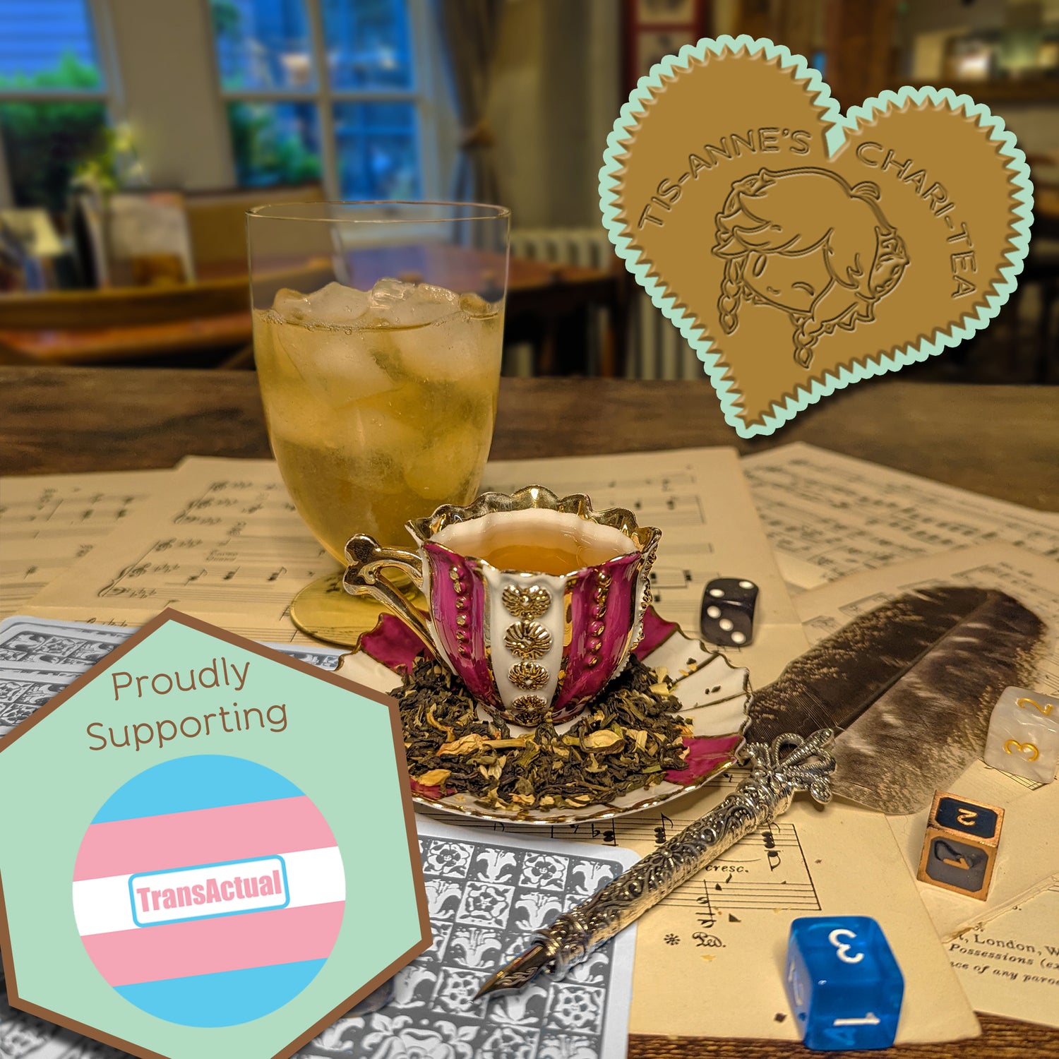A striped and gilded teacup and saucer, next to a glass of iced tea, an elegant quill and sheet music. A heart-shaped badge in one corner reads "Tis-Anne's Chari-Tea", and another emblem reads "Proudly Supporting" with the logo for TransActual.